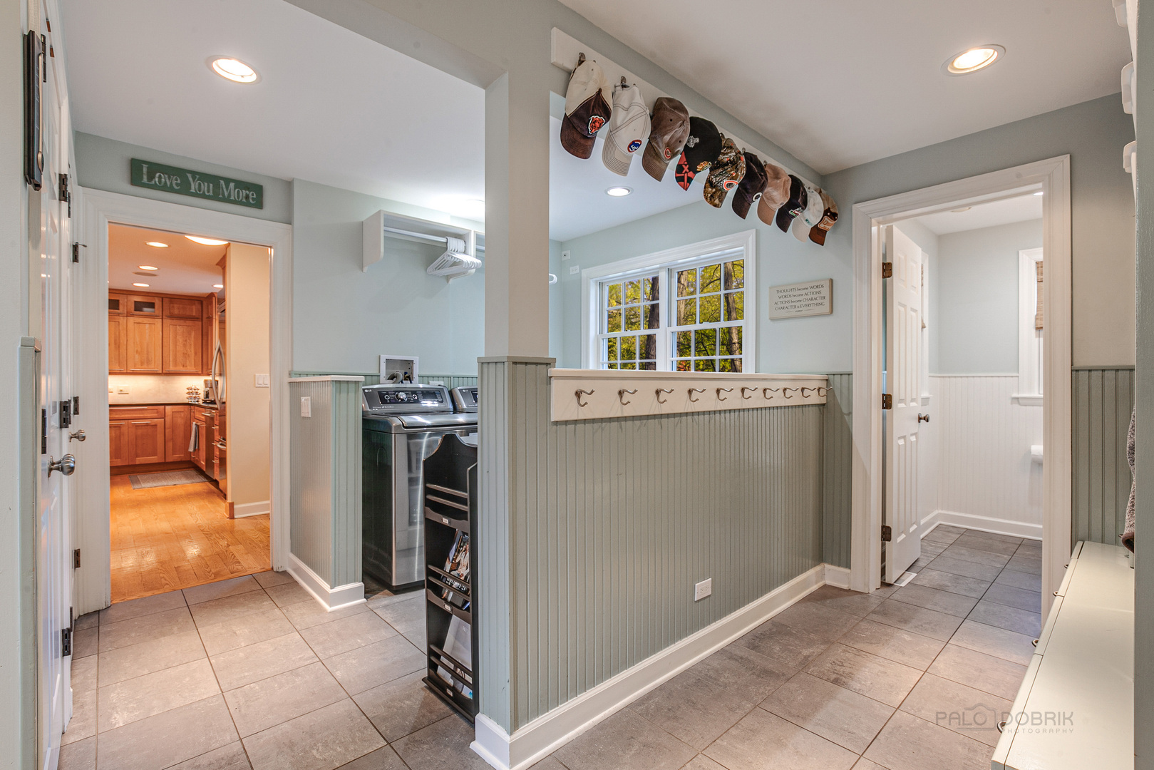 1267 West Deerpath Road Lake Forest, IL 60045 - Photo 38 of 47 a view of a hallway with a dining table & chairs