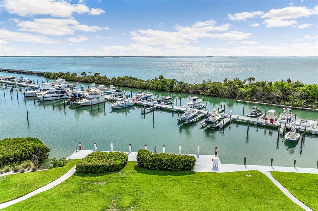 5852 Gasparilla Road, Unit MV13 Boca Grande, FL 33921 - Photo 11 of 37 an aerial view of a house with a lake view