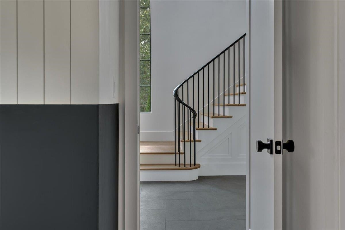 807 Chamberlain Street Raleigh, NC 27607 - Photo 11 of 40 a view of entryway with wooden floor