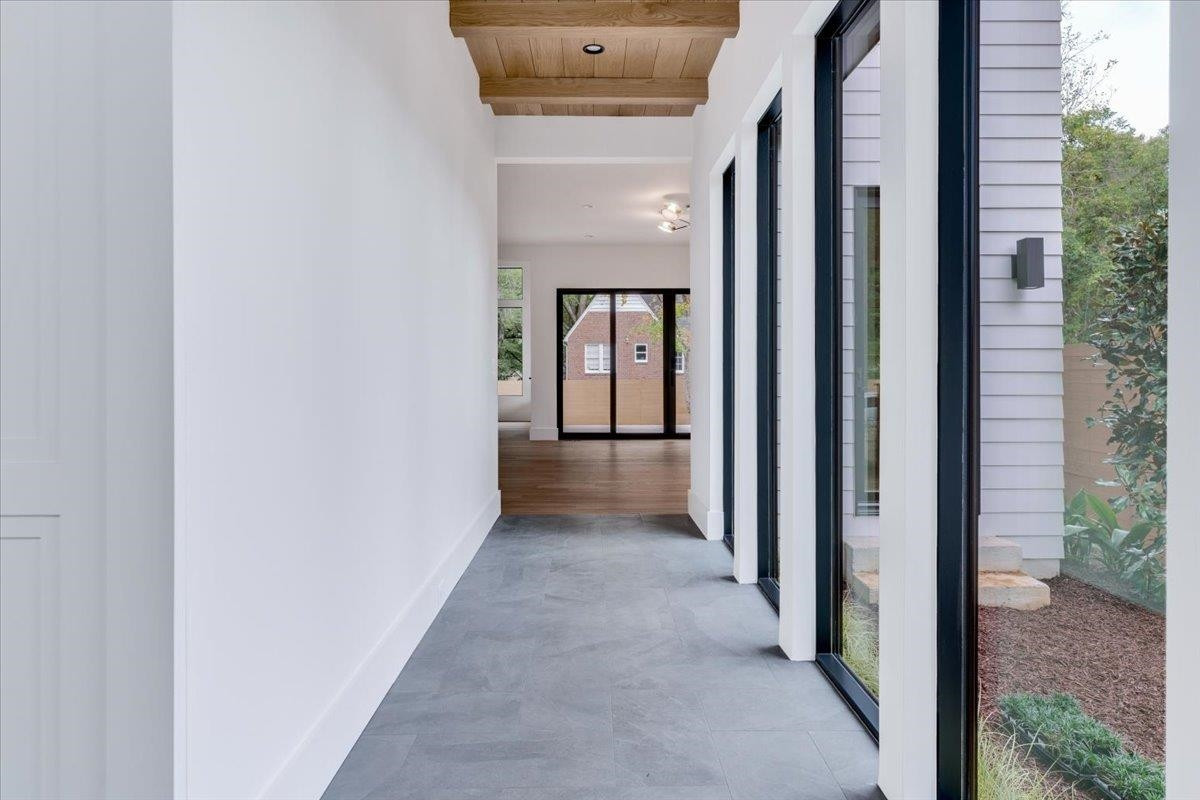 807 Chamberlain Street Raleigh, NC 27607 - Photo 20 of 40 a view of a hallway with a room
