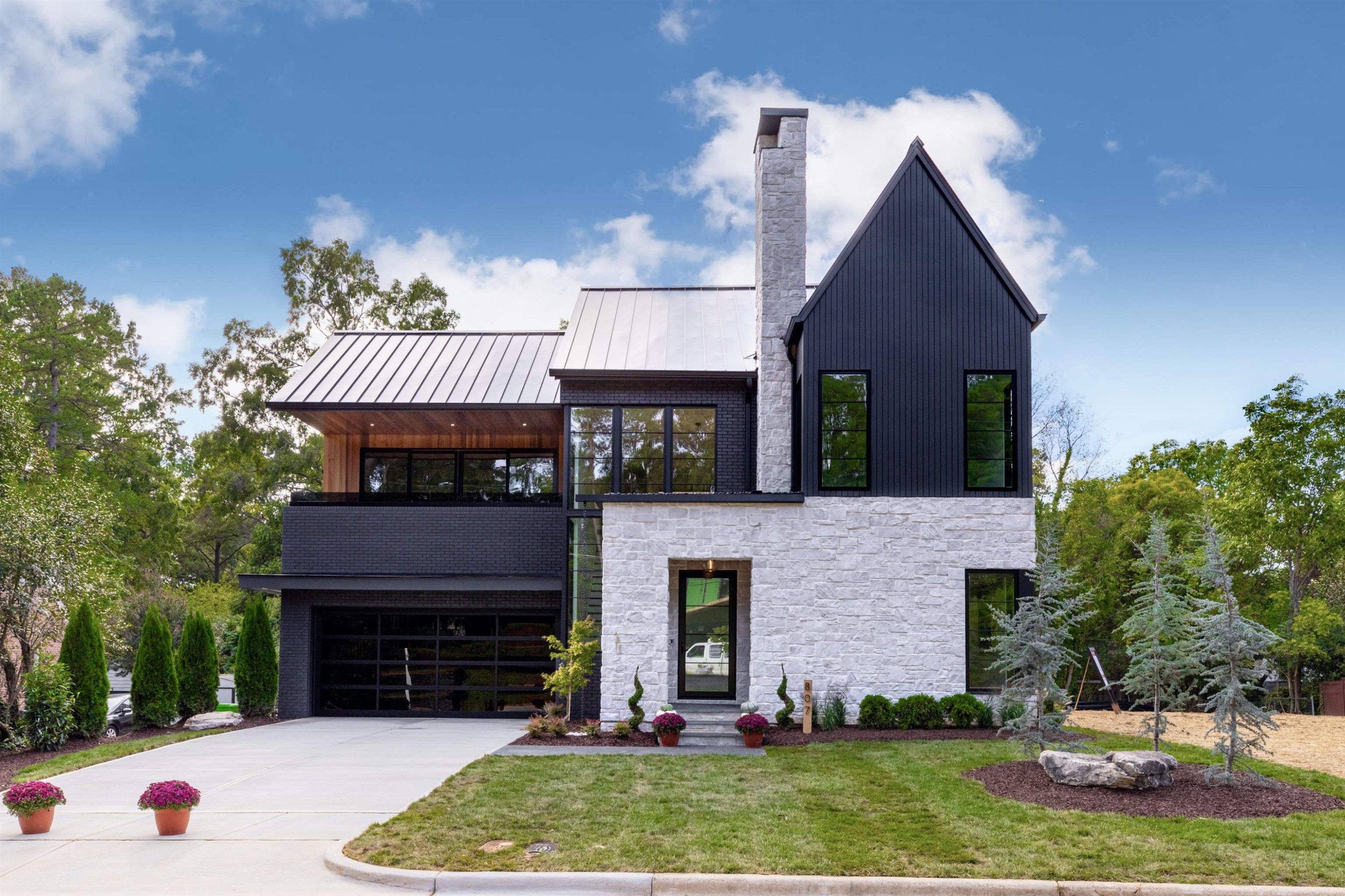 807 Chamberlain Street Raleigh, NC 27607 - Photo 2 of 40 a view of house with yard and entertaining space