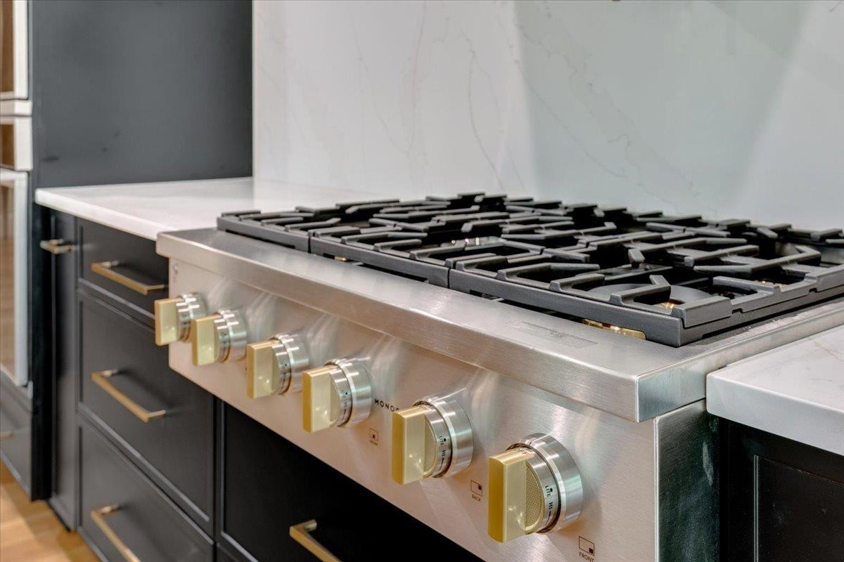 807 Chamberlain Street Raleigh, NC 27607 - Photo 39 of 40 a close up of a sink in a kitchen