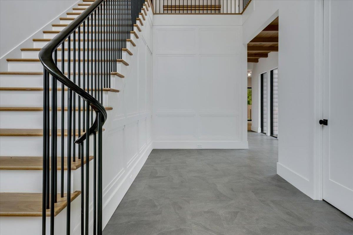 807 Chamberlain Street Raleigh, NC 27607 - Photo 9 of 40 a view of a hallway with wooden floor and entryway