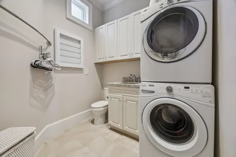 a bathroom with a toilet and a sink
