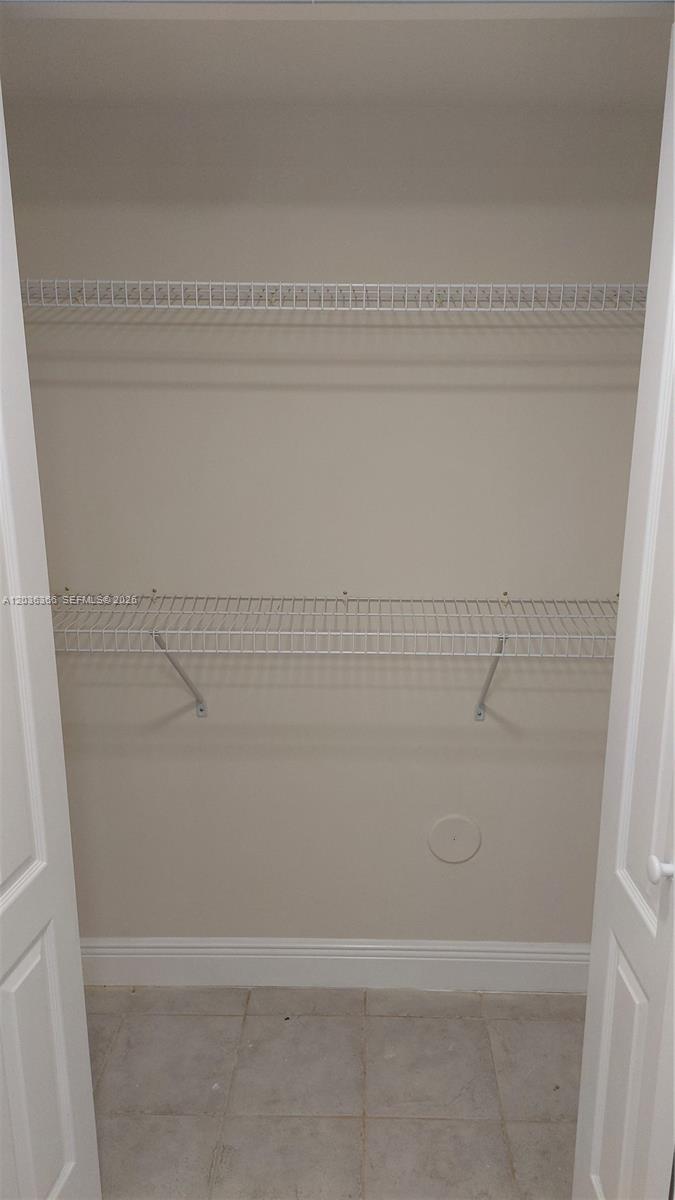 7083 Southwest 158th Court Miami, FL 33193 - Photo 7 of 22 a bathroom with a bathtub