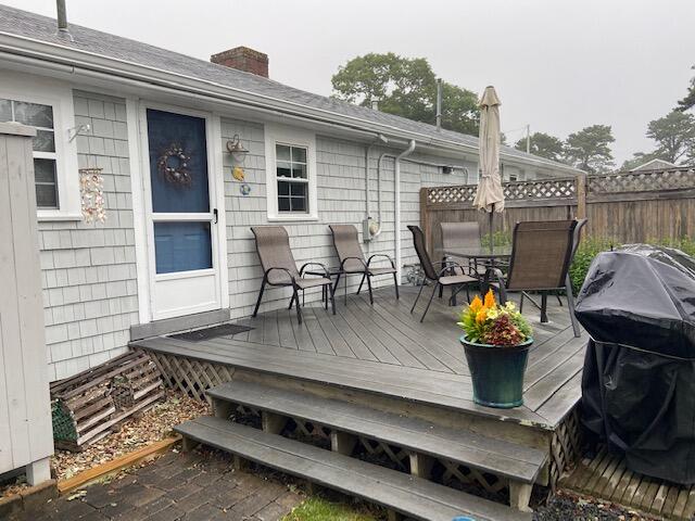 101 Lower County Road, Unit 2B Dennis Port, MA 02639 - Photo 5 of 28 a view of outdoor sitting area with furniture