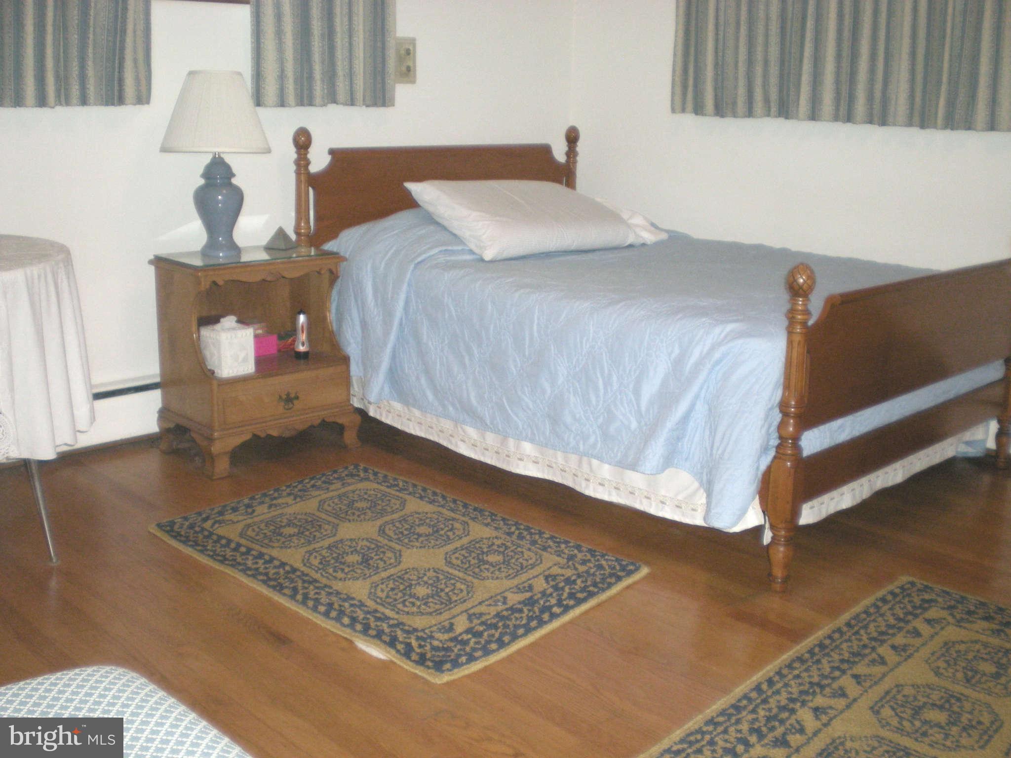 1206 Frederick Road Baltimore, MD 21228 - Photo 17 of 25 Lovely exposed hardwood flooring