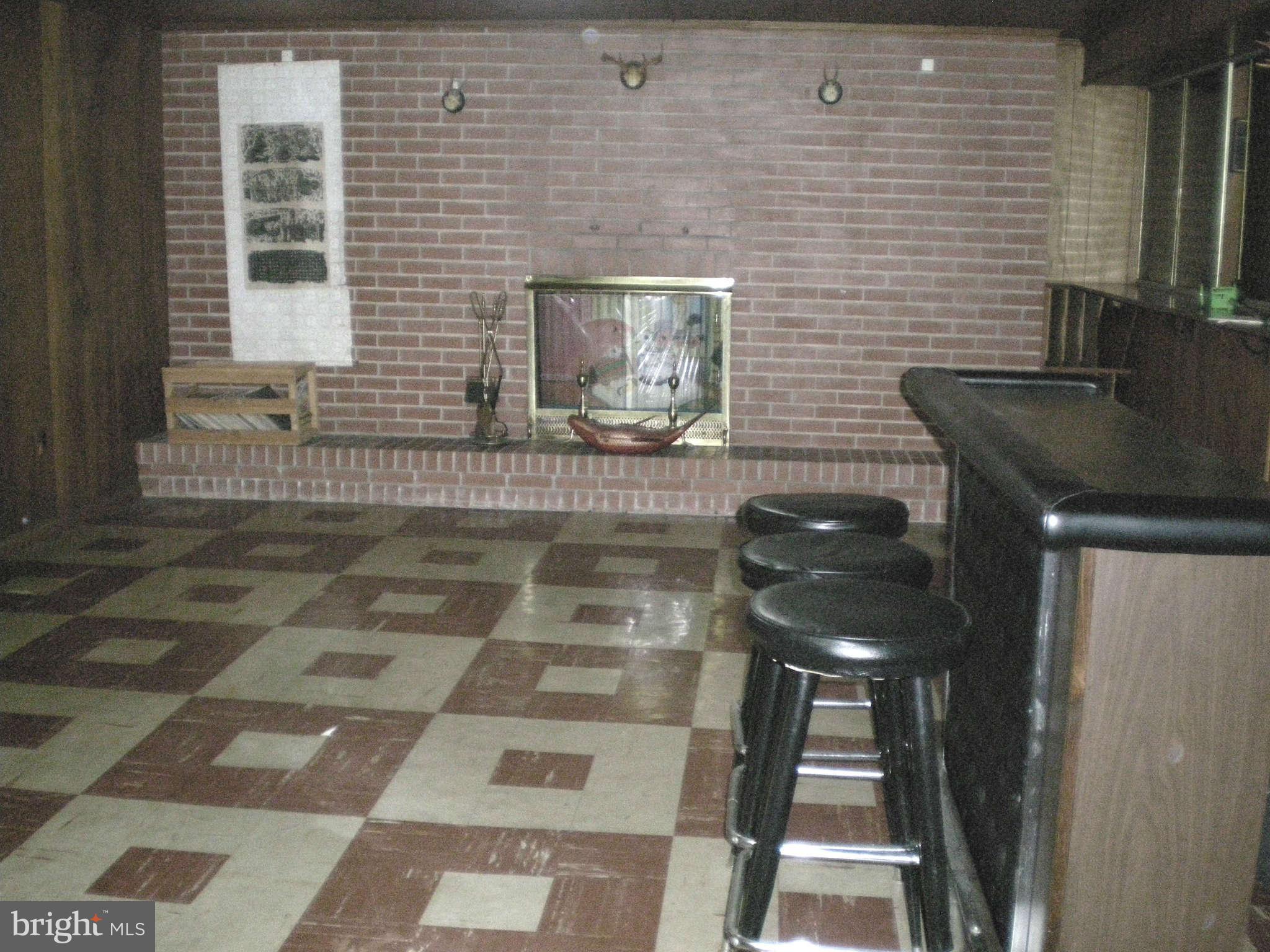 1206 Frederick Road Baltimore, MD 21228 - Photo 21 of 25 Wood burning fireplace