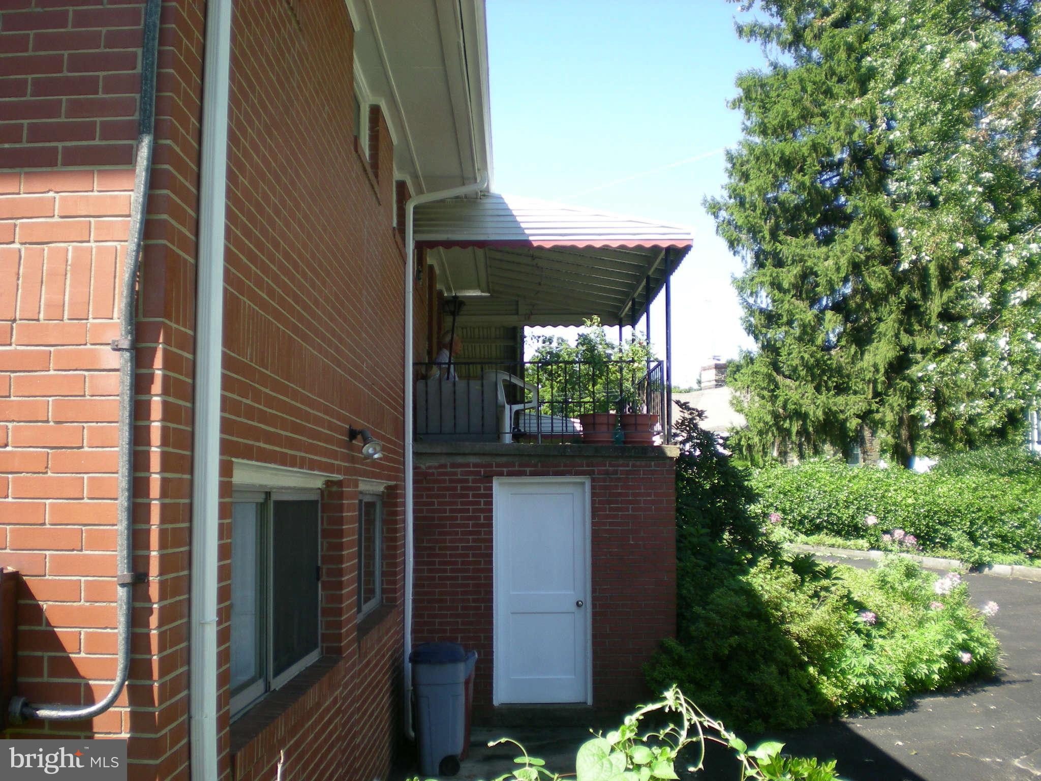 1206 Frederick Road Baltimore, MD 21228 - Photo 4 of 25 extra storage area under rear porch