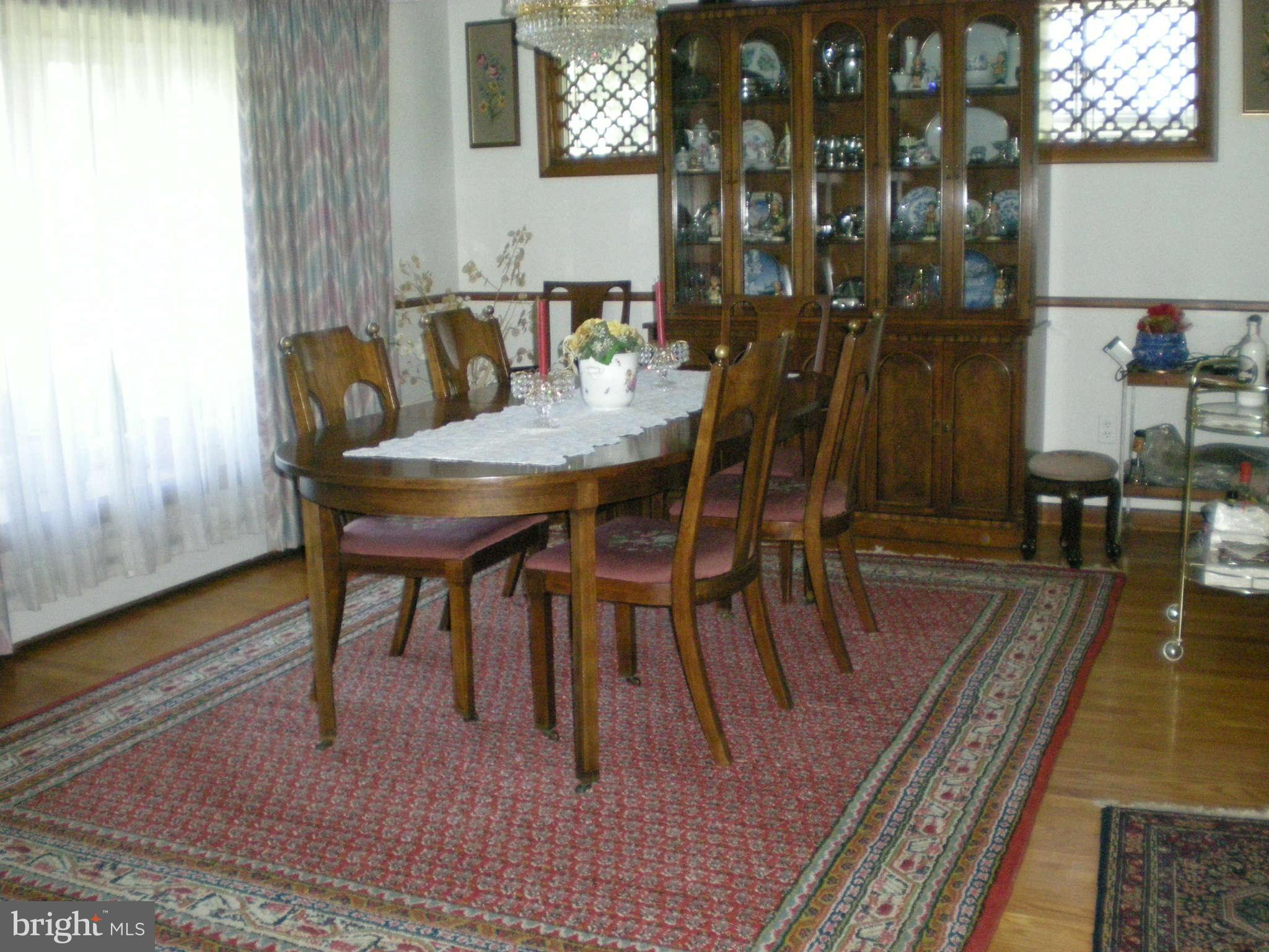 1206 Frederick Road Baltimore, MD 21228 - Photo 10 of 25 Exposed hardwood floors