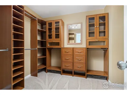 a view of an empty room with empty shelves