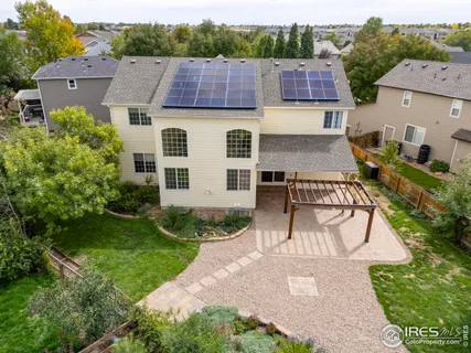 an aerial view of a house with garden