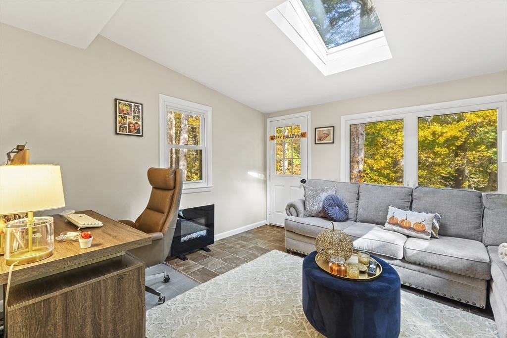 6 Tall Tree Road Sharon, MA 02067 - Photo 17 of 24 a living room with furniture and a window