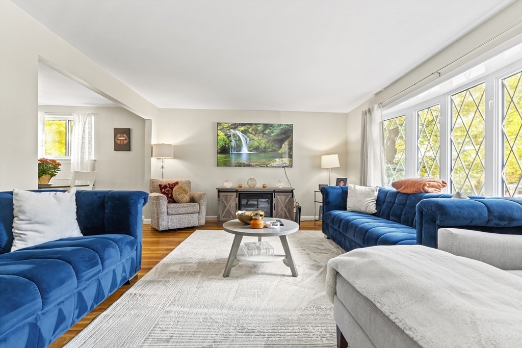 6 Tall Tree Road Sharon, MA 02067 - Photo 3 of 24 a living room with furniture and a large window