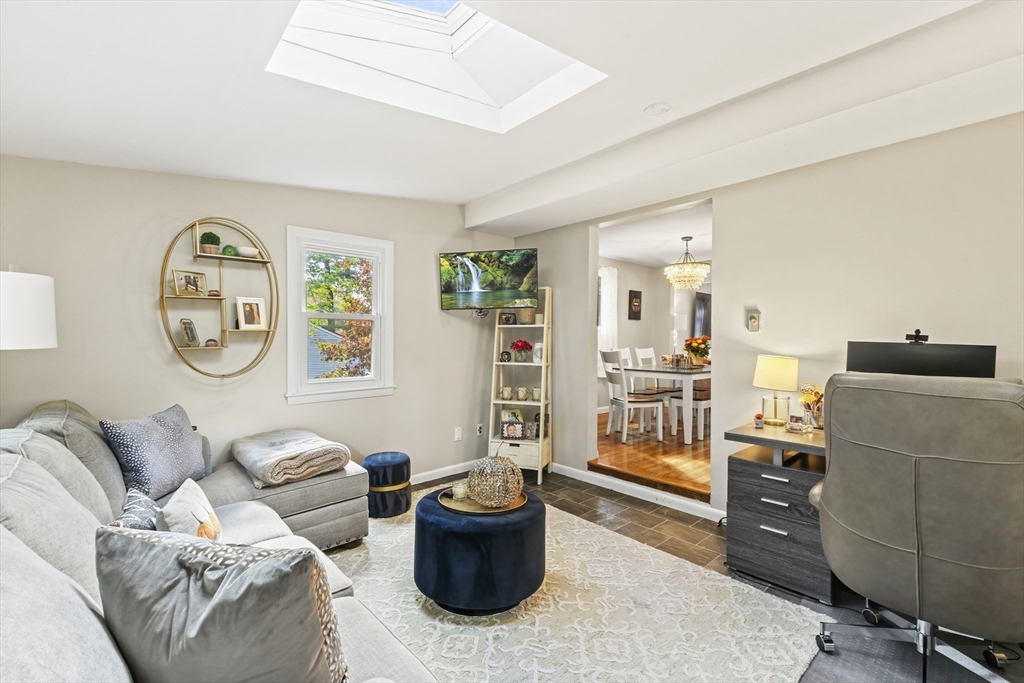 6 Tall Tree Road Sharon, MA 02067 - Photo 6 of 24 a living room with furniture and a flat screen tv