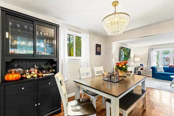 a kitchen with a table and chairs in it