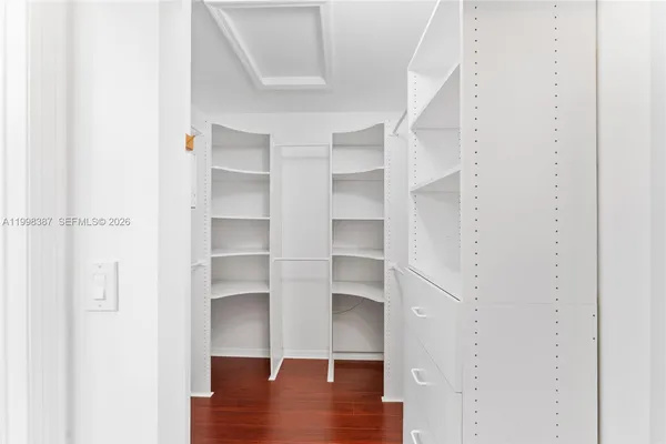 a view of an empty walk in closet