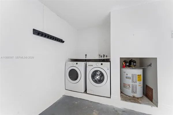 a view of a hallway with a potted plant