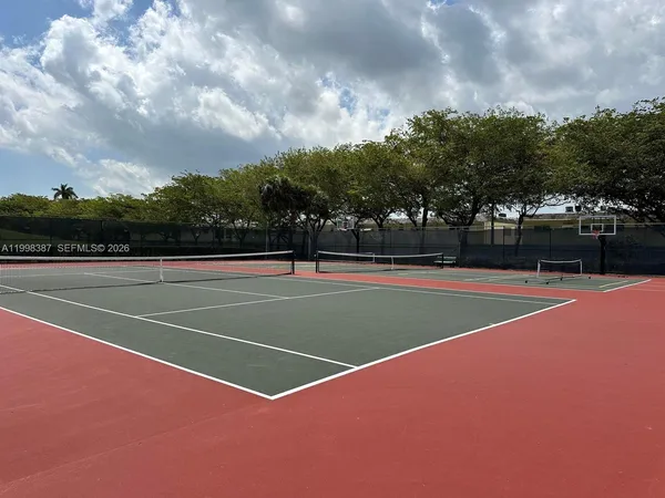 a view of a lake with sitting area