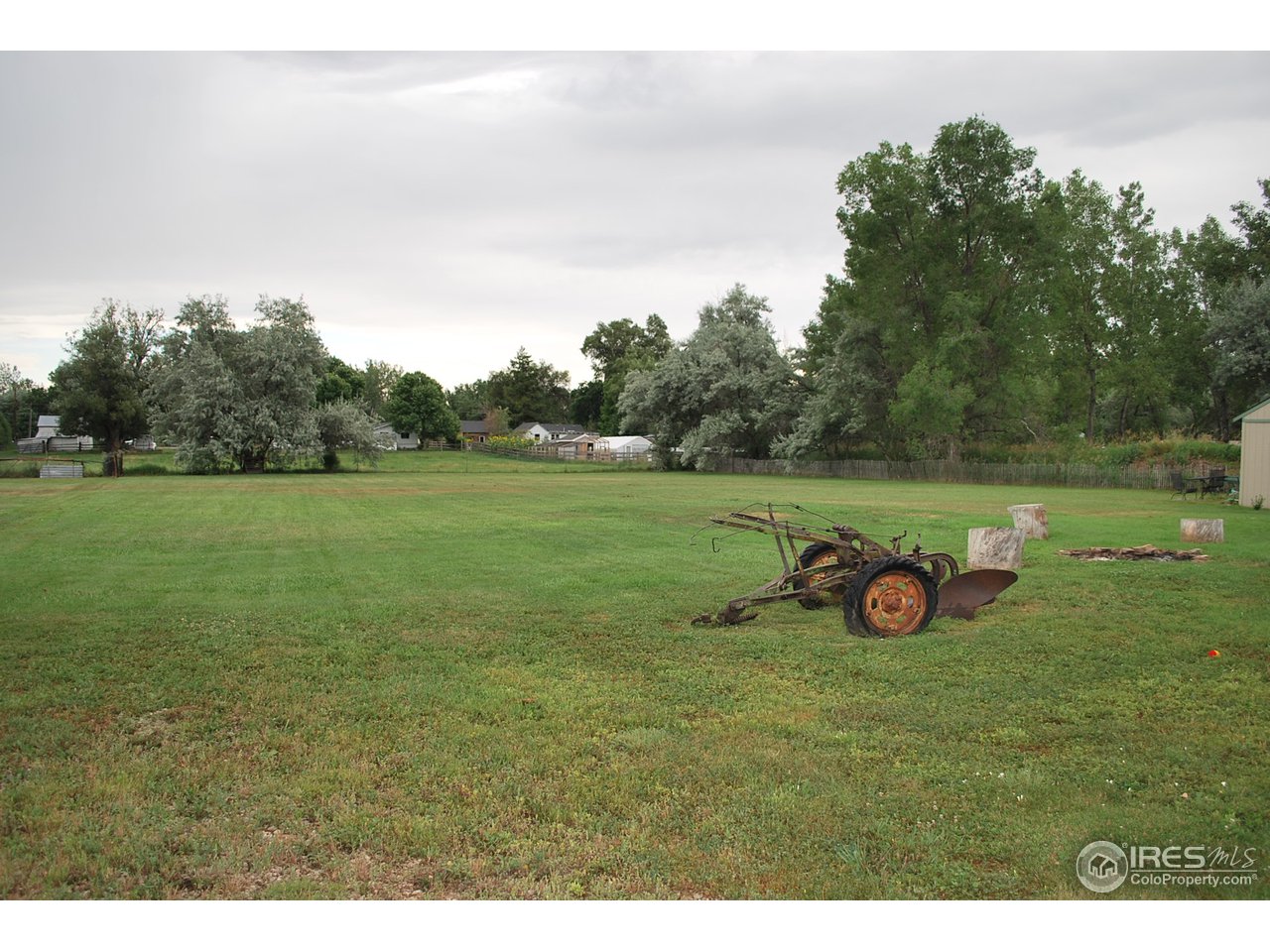 1084 Gapter Road Boulder, CO 80303 - Photo 20 of 25 a view of a field with an trees