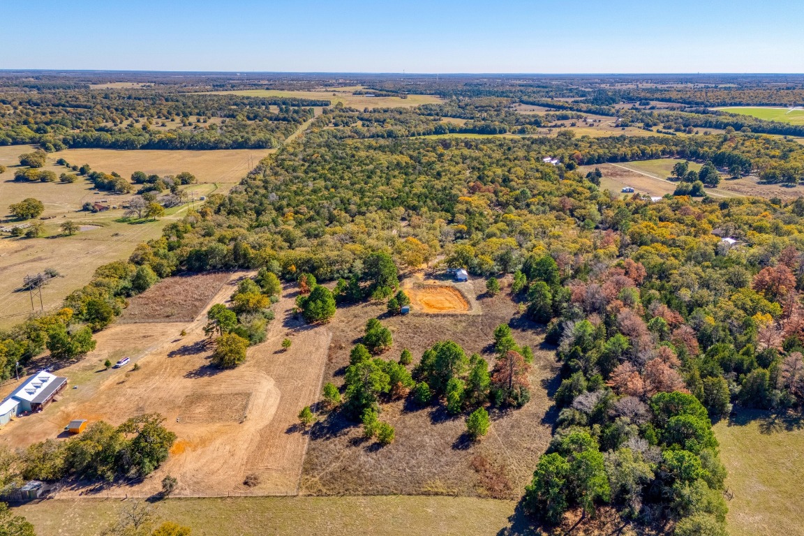 0 Dunbar Road McDade, TX 78650 - Photo 2 of 11 an aerial view of a city