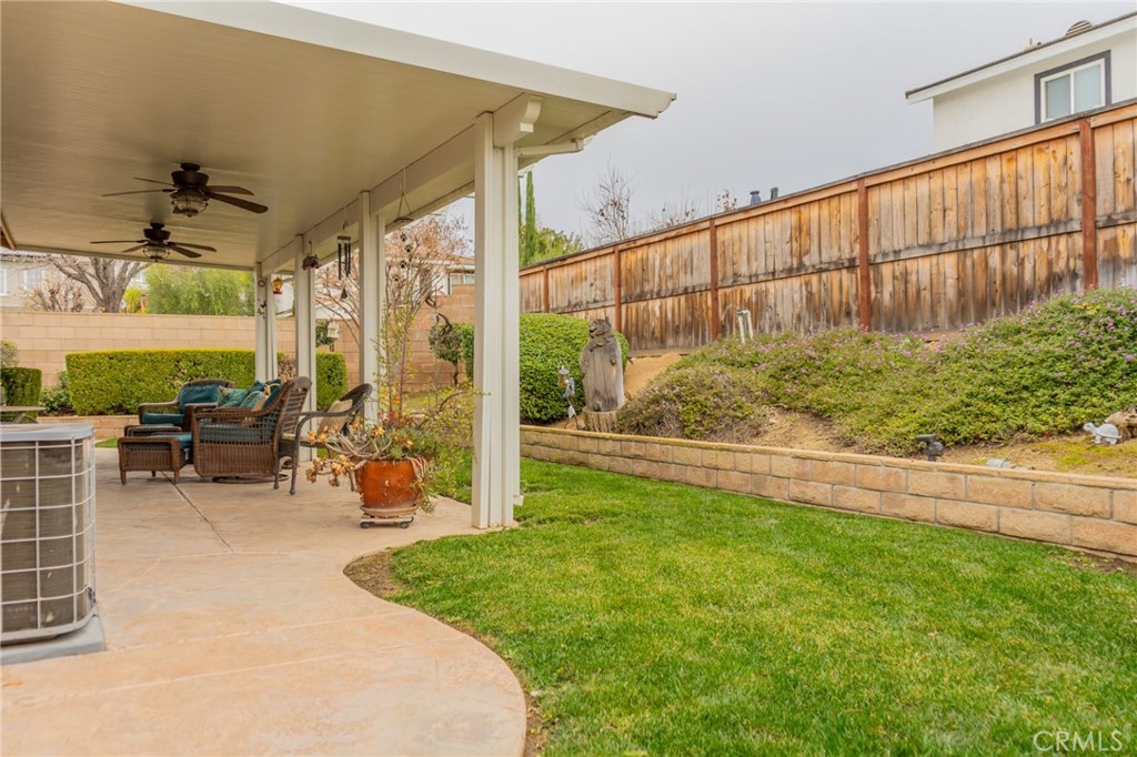 11555 Townsend Way Yucaipa, CA 92399 - Photo 11 of 47 a view of a backyard with sitting area and garden