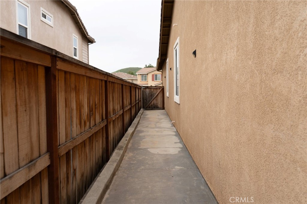 11555 Townsend Way Yucaipa, CA 92399 - Photo 12 of 47 a view of a balcony with wooden fence