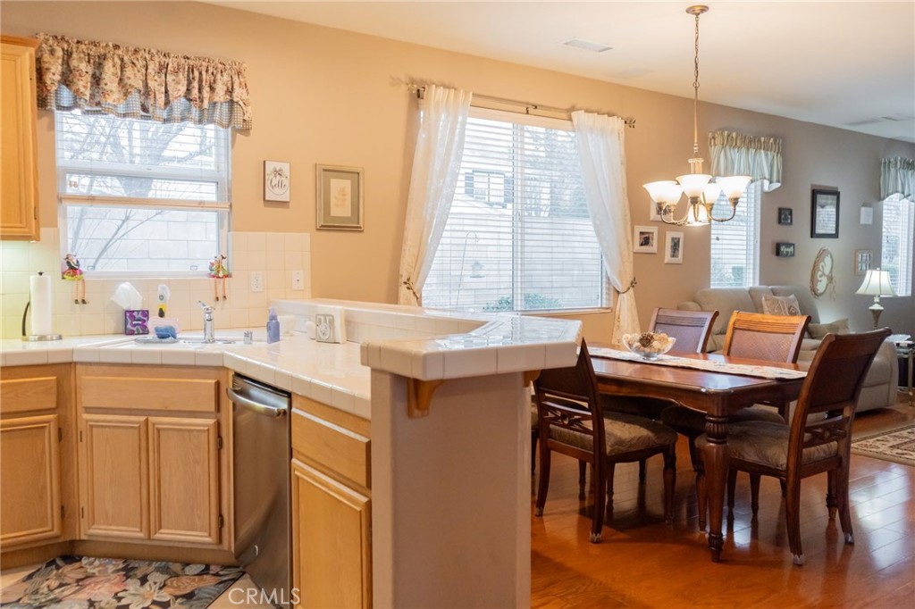 11555 Townsend Way Yucaipa, CA 92399 - Photo 17 of 47 a view of a dining room with furniture and window