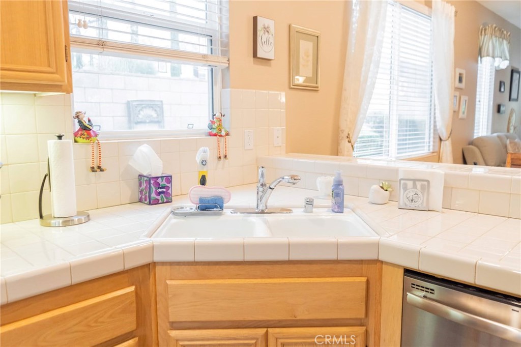 11555 Townsend Way Yucaipa, CA 92399 - Photo 18 of 47 a bathroom with a sink and a window