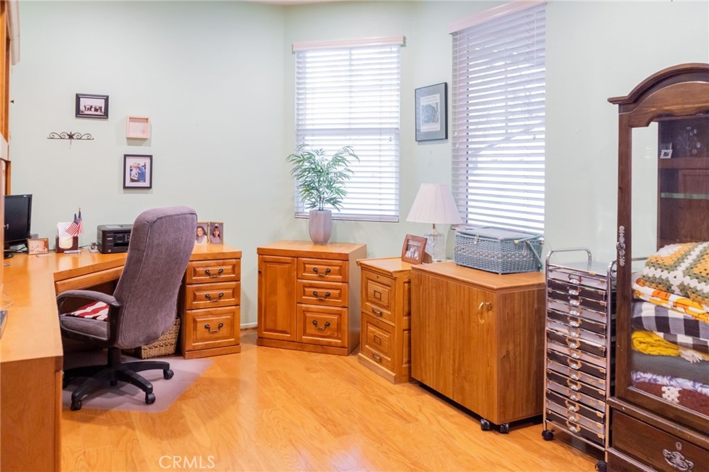 11555 Townsend Way Yucaipa, CA 92399 - Photo 26 of 47 a bedroom with furniture and a window