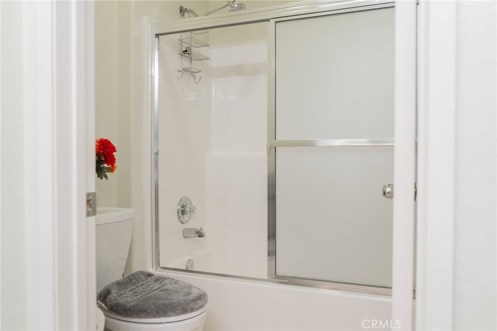 11555 Townsend Way Yucaipa, CA 92399 - Photo 30 of 47 a bathroom with a shower