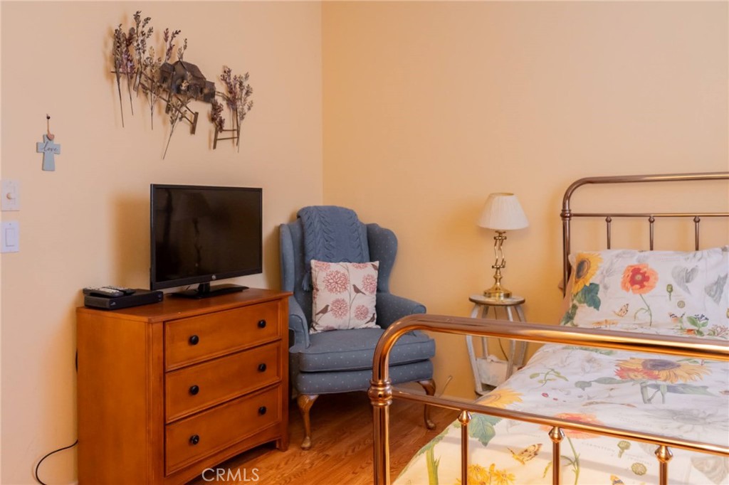 11555 Townsend Way Yucaipa, CA 92399 - Photo 33 of 47 a living room with furniture and a flat screen tv
