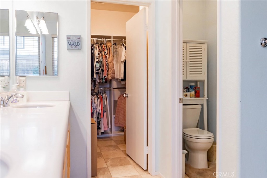 11555 Townsend Way Yucaipa, CA 92399 - Photo 36 of 47 a bathroom with a toilet and a sink