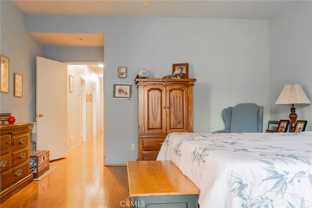 11555 Townsend Way Yucaipa, CA 92399 - Photo 39 of 47 a bedroom with a bed and a table in it