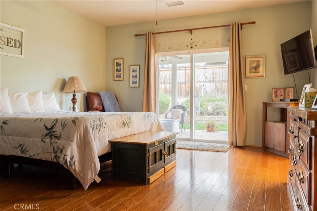 11555 Townsend Way Yucaipa, CA 92399 - Photo 41 of 47 a bed room with a bed and a television