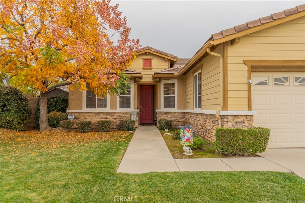 11555 Townsend Way Yucaipa, CA 92399 - Photo 7 of 47 a view of house with yard and outdoor seating