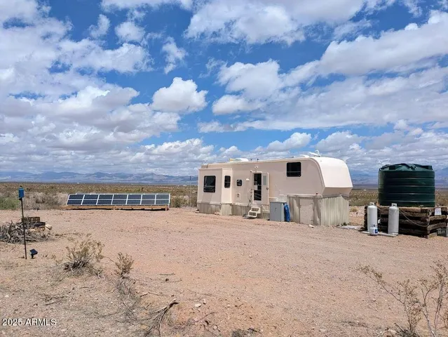 a view of a house with a patio