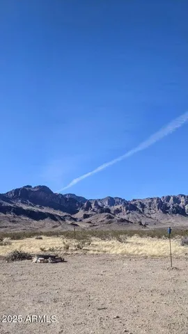 a view of ocean and mountain