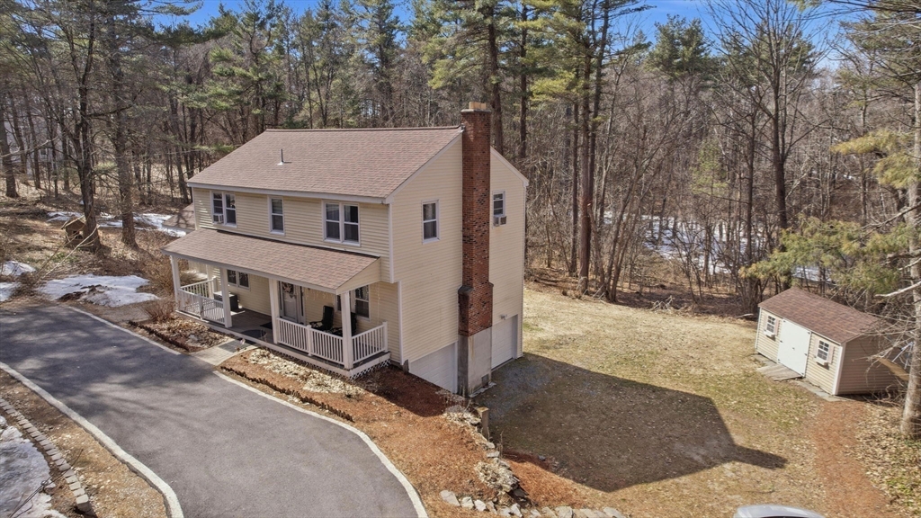 97 Chicopee Row Groton, MA 01450 - Photo 35 of 41 a view of a house with a yard