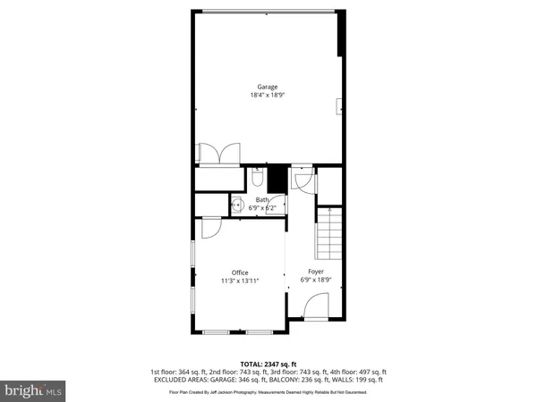 a picture of a bench in front of a wall