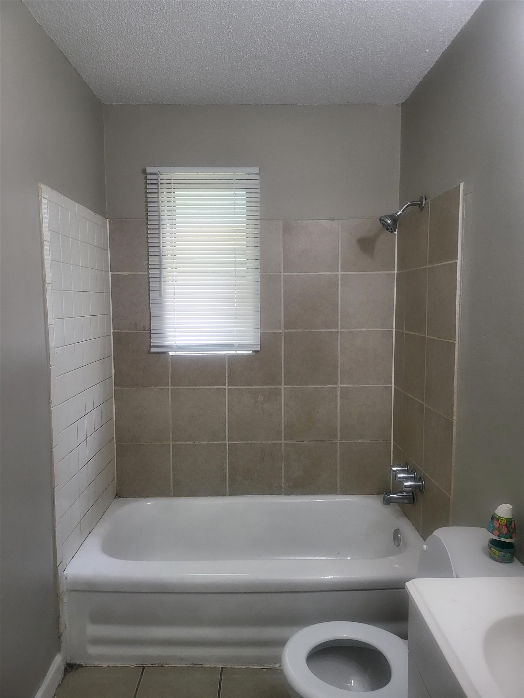3705 Suzanne Drive Memphis, TN 38127 - Photo 10 of 10 a bathroom with a sink a toilet and bathtub