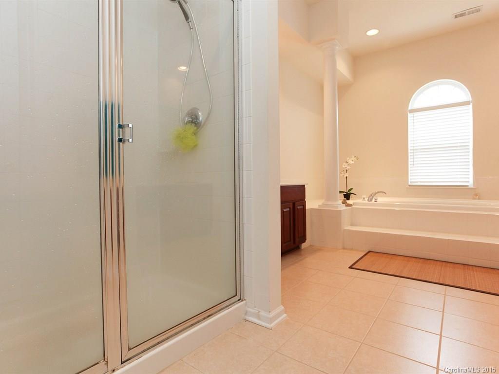1962 Faison Avenue Fort Mill, SC 29708 - Photo 18 of 24 a bathroom with a bathtub and a shower