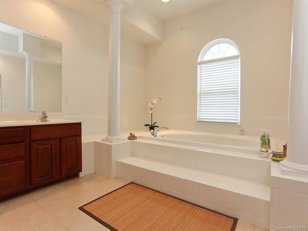 1962 Faison Avenue Fort Mill, SC 29708 - Photo 19 of 24 a spacious bathroom with a tub sink and mirror