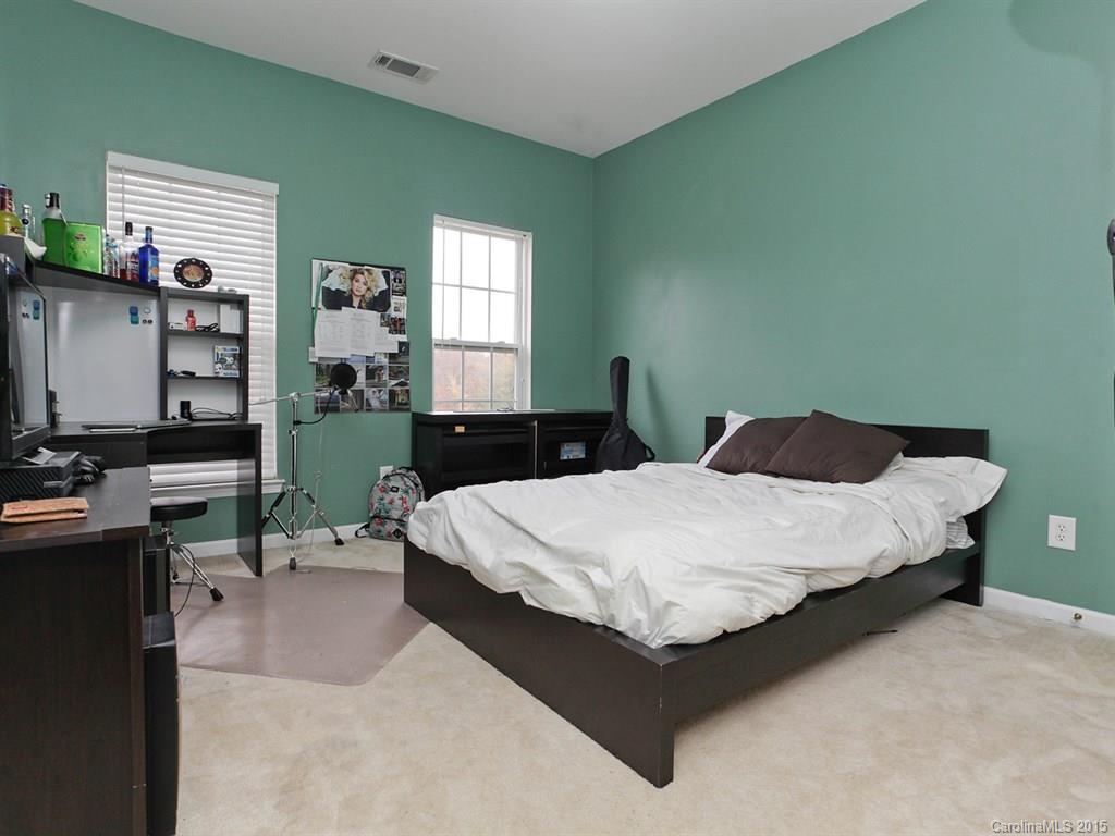 1962 Faison Avenue Fort Mill, SC 29708 - Photo 22 of 24 a bedroom with a bed and window