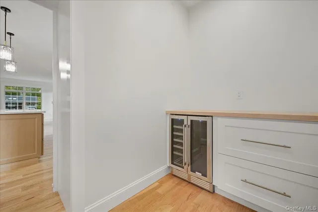 a kitchen with stainless steel appliances granite countertop a stove and a refrigerator