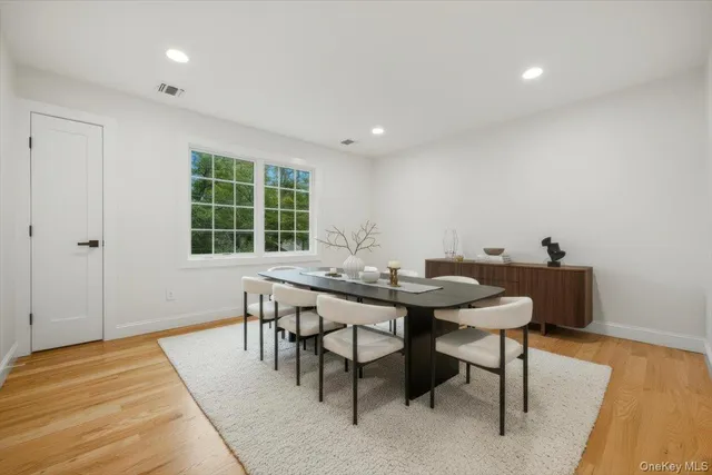 a spacious bedroom with a large bed and a couch