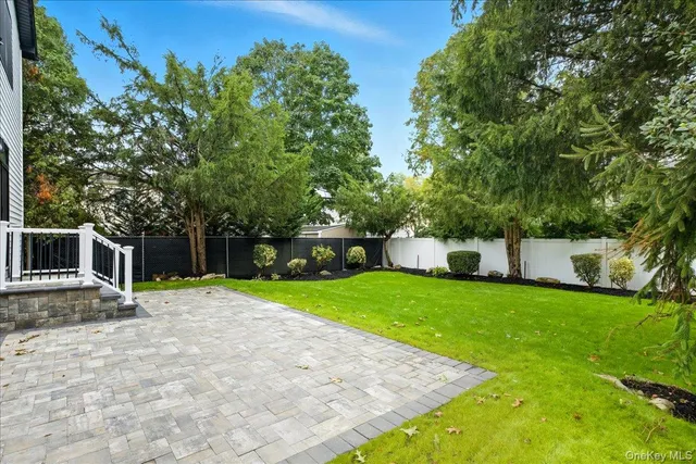 a view of an empty room with a garage