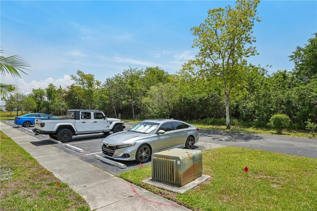 13345 Broadhurst Loop Fort Myers, FL 33919 - Photo 31 of 33 View of uncovered parking lot