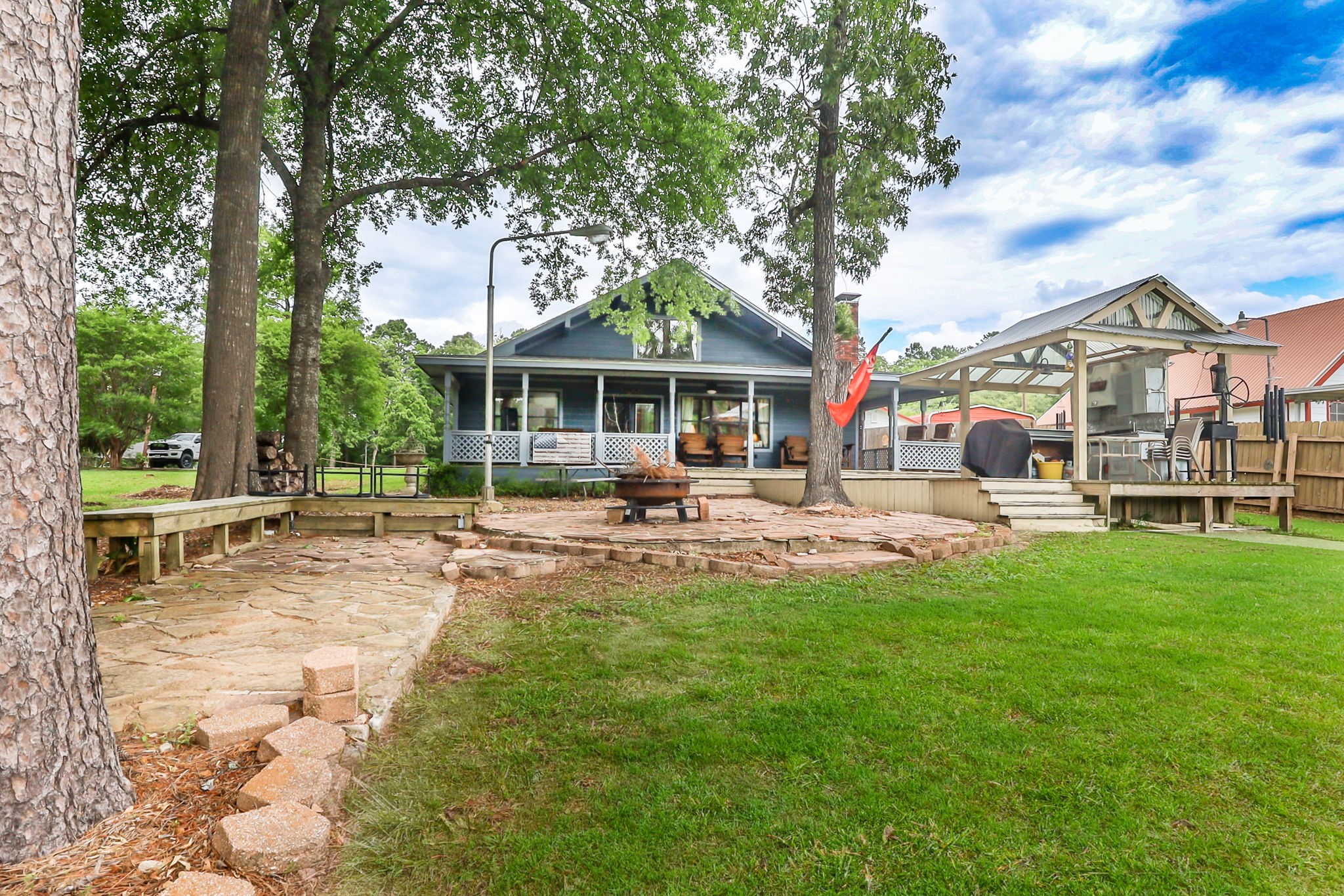 628 County Road 452 Bronson, TX 75930 - Photo 14 of 50 a swimming pool with outdoor seating and yard