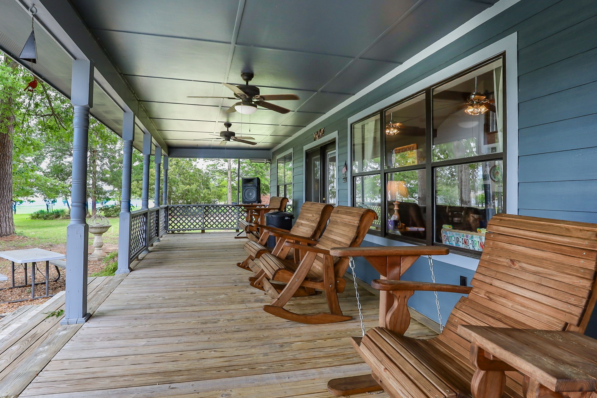 628 County Road 452 Bronson, TX 75930 - Photo 18 of 50 a view of a patio with wooden floor and outdoor seating